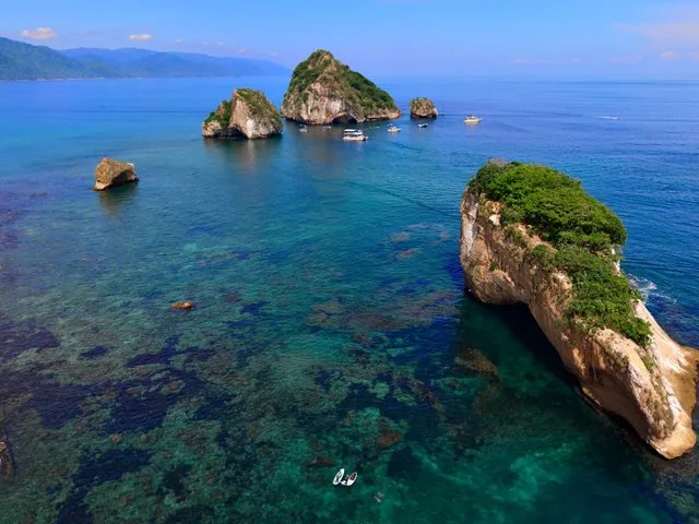 Aerial view of the rocky islands of Los Arcos Marine Park.